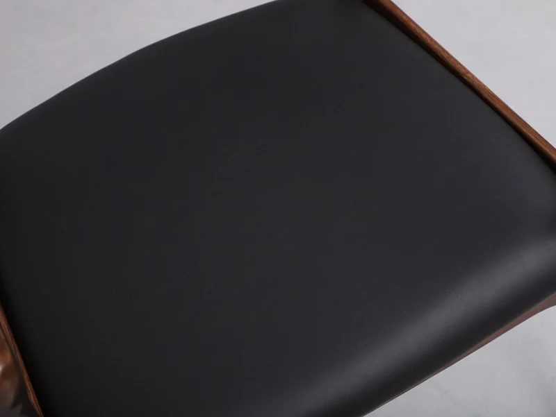 Illuminate Black Leather Padded Walnut Wood Chair