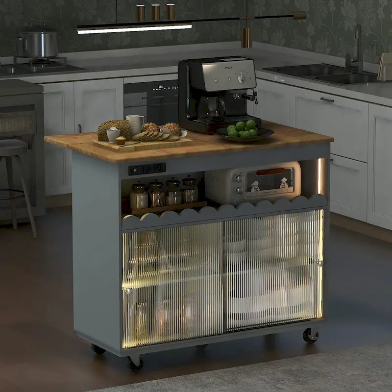 Îlot de cuisine de 112 cm de large avec dessus en caoutchouc à abattant, sur 5 roulettes, avec étagère ouverte et casier à vin