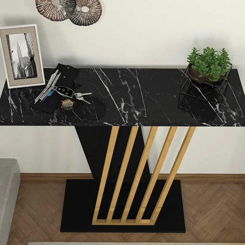 Consolle ingresso effetto marmo nero con struttura nera e dettagli oro Gravity
