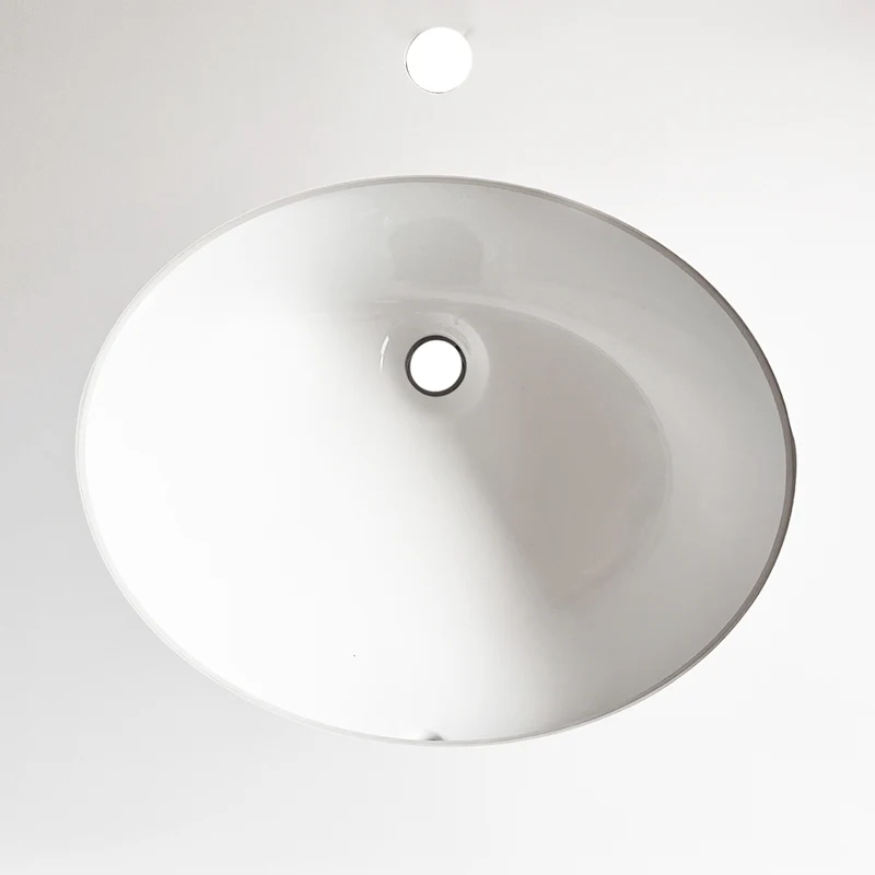 Lavabo da incasso con top in pietra sinterizzata e vasca in ceramica bianco lucido YJ12250