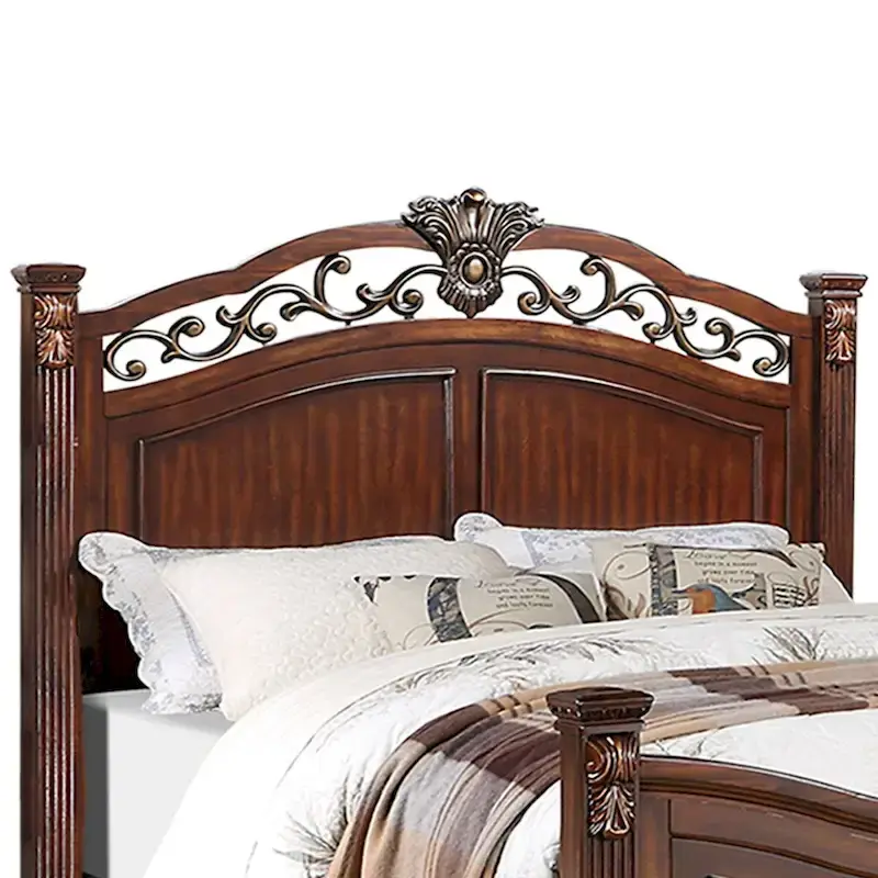 Lit en bois avec tête de lit sculptée en merisier foncé