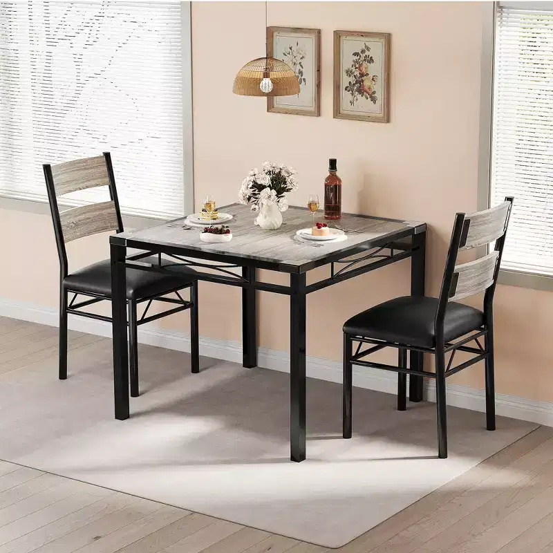 Ensemble de table à manger peu encombrant en MDF avec base en fer et chaises gigognes pour petite cuisine, appartement ou coin petit-déjeuner
