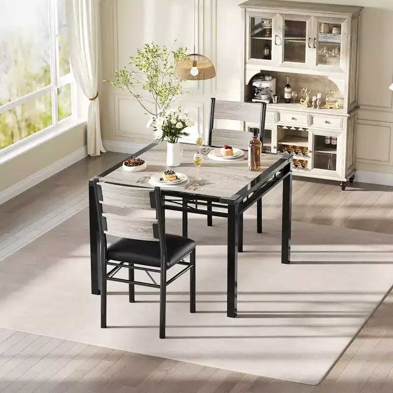 Ensemble de table à manger peu encombrant en MDF avec base en fer et chaises gigognes pour petite cuisine, appartement ou coin petit-déjeuner