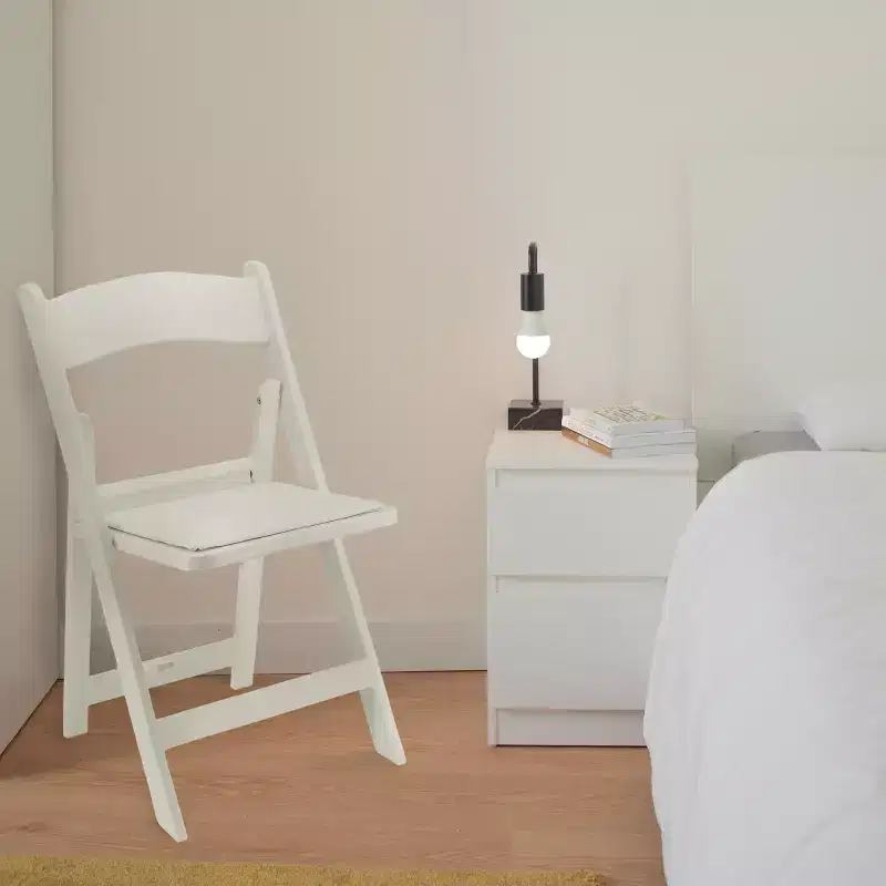 Chaise pliante en résine Elama 4 pièces en plastique blanc avec coussin d'assise amovible
