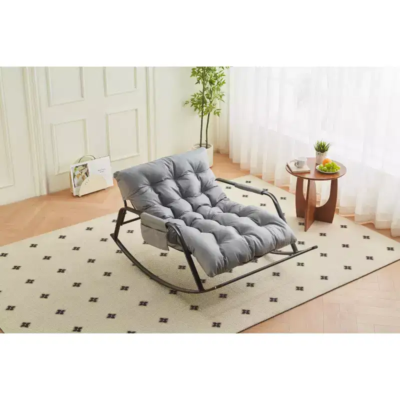 Fauteuil à bascule en cuir avec coussins, fauteuil coulissant, design inclinable circulaire et style moderne, adapté aux salons et chambres.